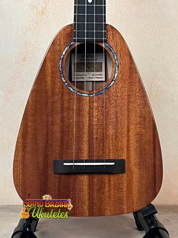 Pineapple-shaped ukulele with mahogany finish from Pepe Romero TTM-23032 Tiny Tenor