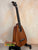 Pineapple-shaped ukulele with wood body and black pegs, Pepe Romero TTM-23032 Tiny Tenor