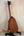 Wooden ukulele on black stand for Pepe Romero TTM-23032 Tiny Tenor Mahogany