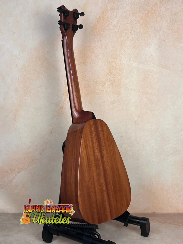 Wooden ukulele on black stand for Pepe Romero TTM-23032 Tiny Tenor Mahogany