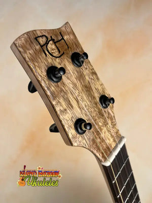 Ukulele headstock with tuning pegs, part of the Phil Henderson Solid Mango Tenor Ukulele