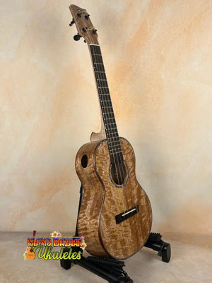 Wooden Phil Henderson Custom PCH Tenor Ukulele on stand in solid mango wood