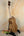 Wooden Phil Henderson Solid Mango Tenor Ukulele on a stand for quality sound