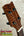 Ukulele headstock with black tuning pegs on Phil Henderson Custom Tenor Ukulele the ladder featuring PCH tenor ukulele luthier Phil Henderson