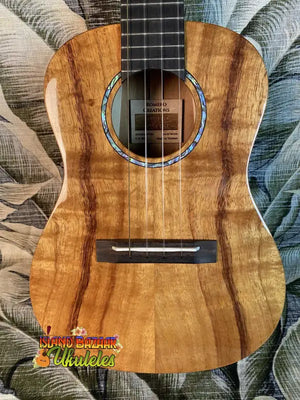 Beautiful acoustic guitar with rich wood grain and blue inlay, Romero Creations Concert Ukulele