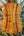 Wooden back panel of Romero Creations Concert Ukulele showcasing rich koa wood grain