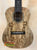 Wooden Romero Creations Concert Ukulele with spalted maple grain patterns and case