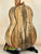 Wooden acoustic guitar with spalted maple back displayed with Romero RC-R-MG Tenor Ukulele