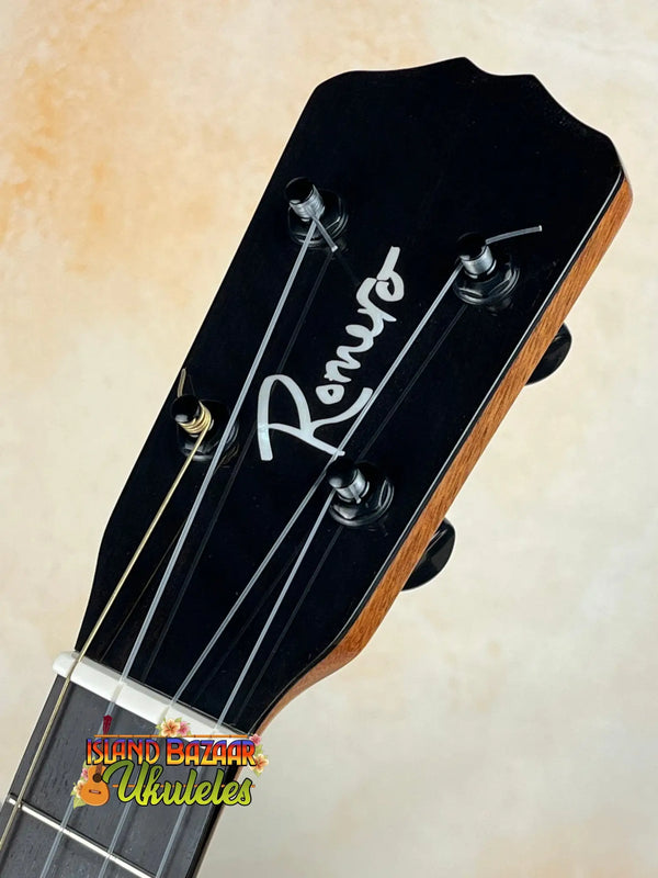 Guitar headstock with Romero logo on Romero RC-R-MG Tenor Ukulele in Spalted Mango signature