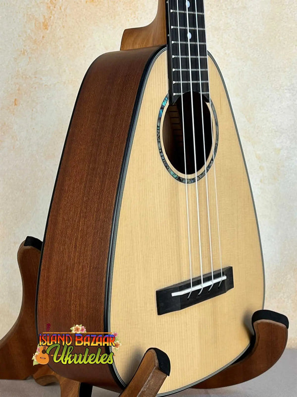 Natural spruce-top wooden ukulele from Romero Creations with polyfoam case at Island Bazaar