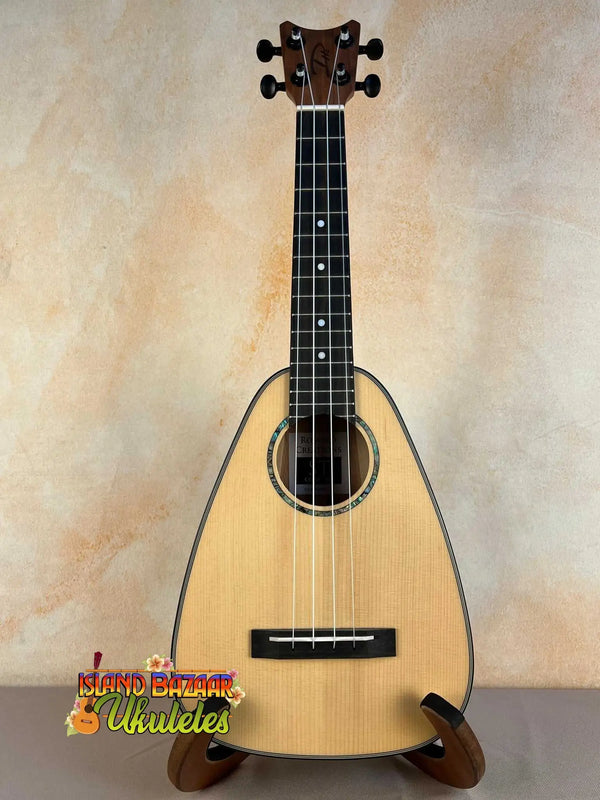 Teardrop-shaped wooden ukulele with natural finish and black accents from Romero Creations