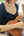 Wooden ukulele being played, demonstrating ShipTection Shipping Protection for safe delivery