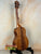 Wooden KoAloha Royal Pikake Tenor Ukulele KTM-10RP on black stand