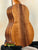 Beautiful KoAloha Royal Pikake tenor ukulele with rich wood grain and curved body