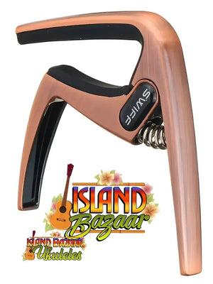 Rose gold Swiff Ukulele K8-U capo with black padding and spring mechanism at Island Bazaar Ukes
