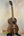 Dark brown Tenor Acacia Ukulele with natural wood grain in Beginners Bundle set