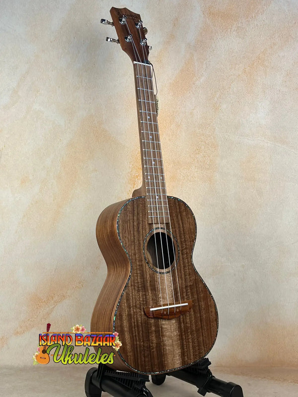 Dark brown Tenor Acacia Ukulele with natural wood grain in Beginners Bundle set