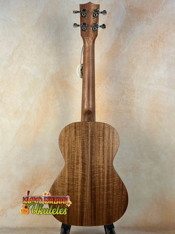 Wooden acoustic guitar with koa finish in Tenor Acacia Ukulele Beginners Bundle