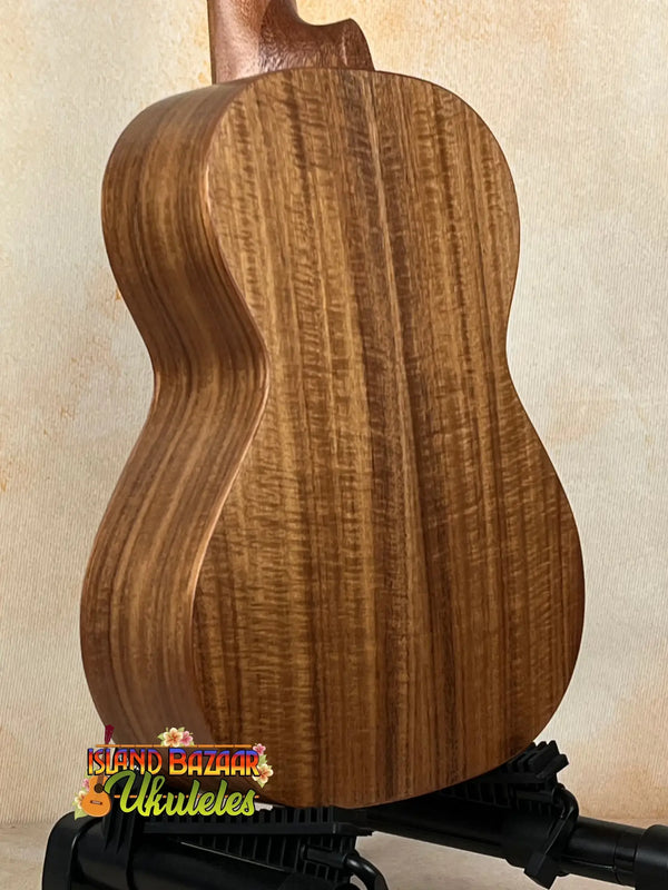 Acoustic guitar featuring stunning figured walnut, ideal for Tenor Acacia Ukulele beginners