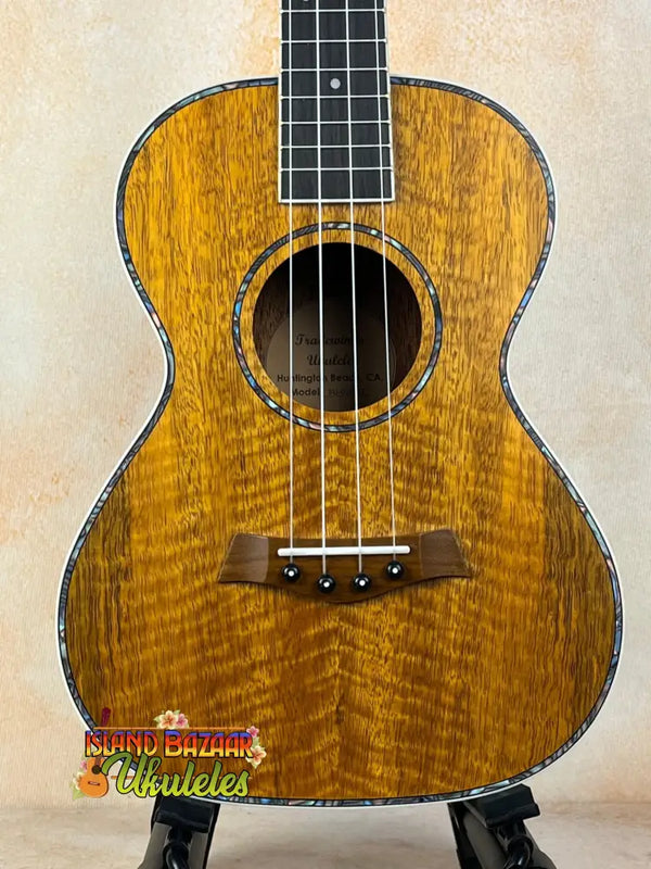 Beautiful Koa wood tenor ukulele in Tenor Mango Ukulele Beginners Bundle from Southern California retail