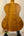 Wooden acoustic guitar with rich brown finish in Tenor Mango Ukulele Beginners Bundle
