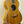 Beautiful wooden tenor mango ukulele with rich honey-colored grain in beginners bundle