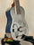 Silver resonator concert ukulele from Tradewinds Resonator Concert series with case