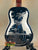 Blue resonator concert ukulele with etched tropical scene from Tradewinds Resonator Concert line