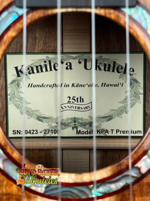 Kamile’a 25th Anniversary label visible in Unique Kanile’a Premium Tenor Ukulele KPA Hawaiian Koa