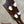 Dark brown wooden vintage martin custom baritone ukulele headstock with four white plastic tuning pegs