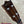 Dark brown wooden headstock of a vintage martin custom baritone ukulele from the late 1960s pre owned