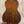 Back of a warm-toned vintage martin baritone ukulele with glossy wood grain finish custom late 1960s model