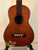 Brown wooden Vintage Martin Soprano Ukulele from the 1940s-50s, modified and well-loved