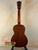 Brown back of a Vintage Martin Soprano Ukulele from the 1940s-50s, modified and well-loved