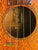 Ukulele sound hole and strings of a Vintage Martin Soprano from the 1940s-50s